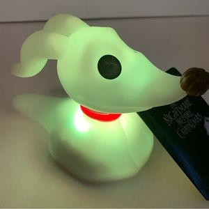 NWT. Zero light up figurine. Plastic Zero dog figurine from Disney’s NBC